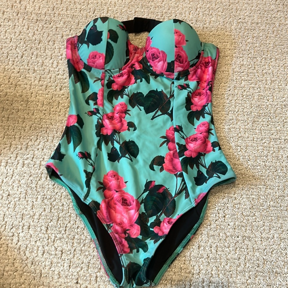 Love love this I just never wear it! Fits so well